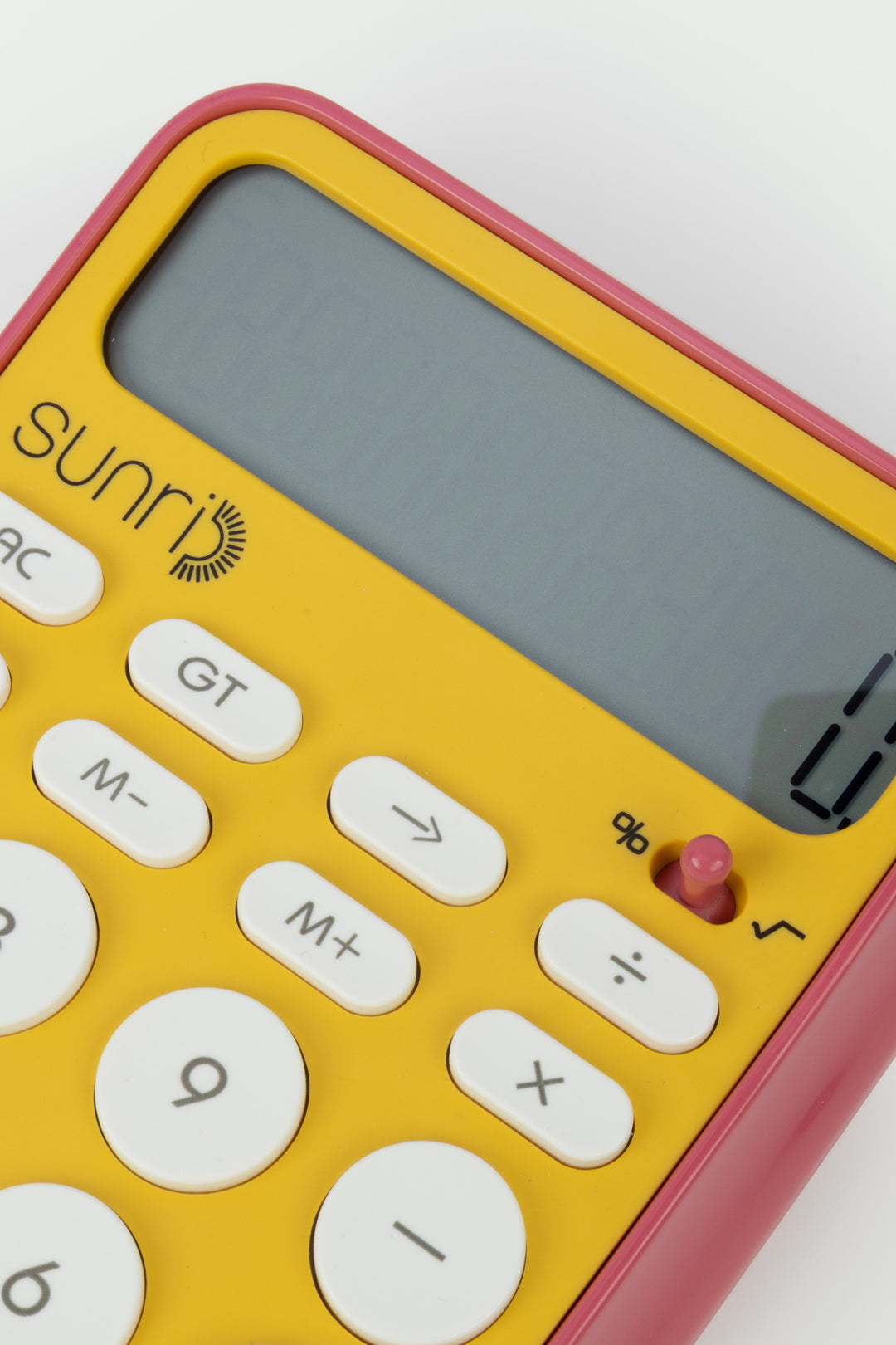 Yellow calculator with pink border on a white background