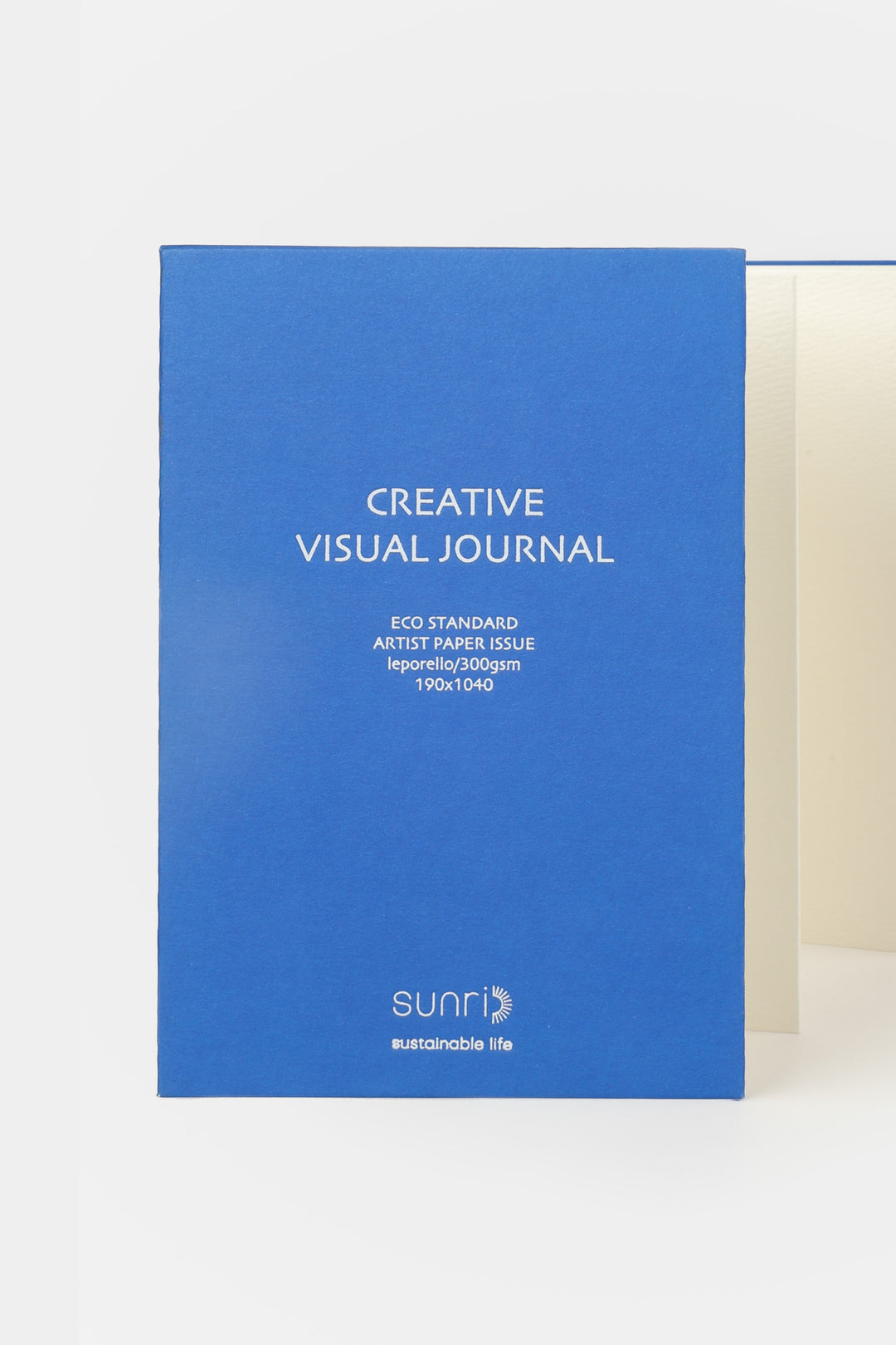 Blue 鈥楥reative Visual Journal鈥?with 鈥榮unri鈥?branding shown front facing with leporello pages slightly visible
