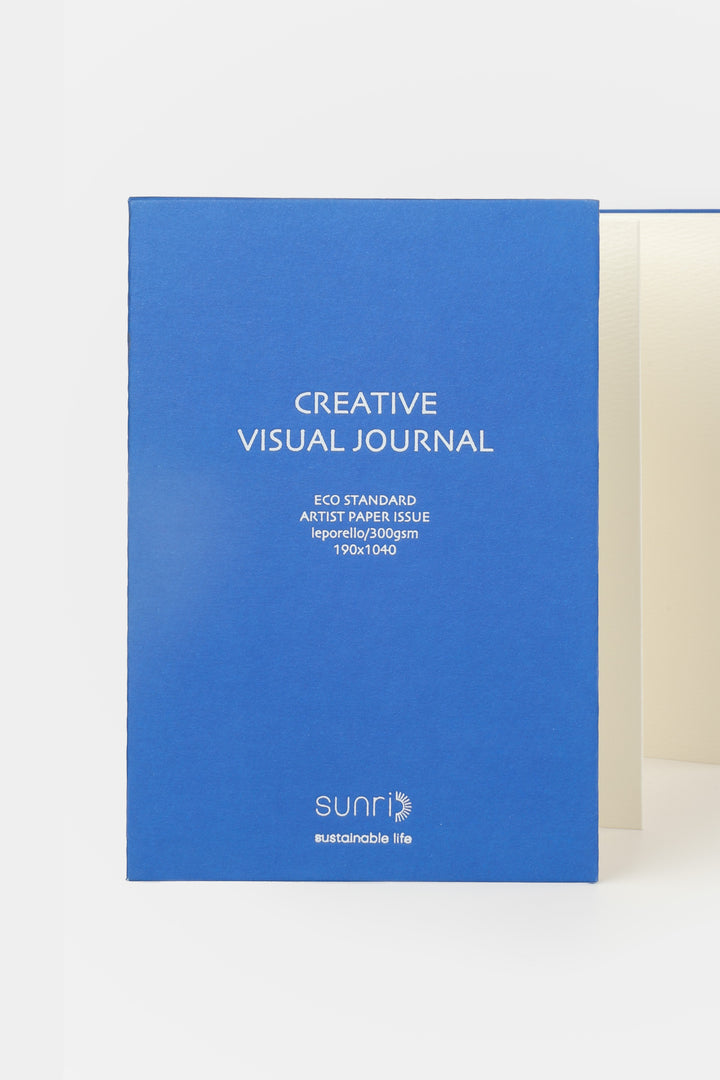 Blue 鈥楥reative Visual Journal鈥?with 鈥榮unri鈥?branding shown front facing with leporello pages slightly visible
