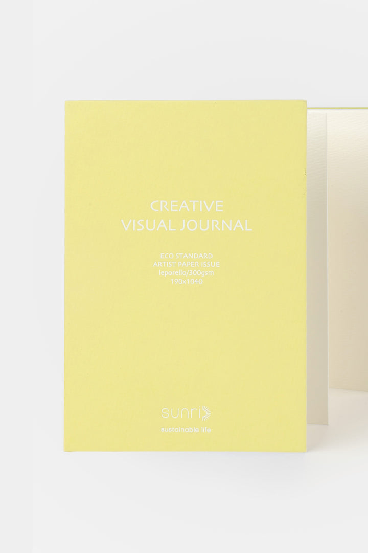 yellow 鈥楥reative Visual Journal鈥?with 鈥榮unri鈥?branding shown front facing with leporello pages slightly visible
