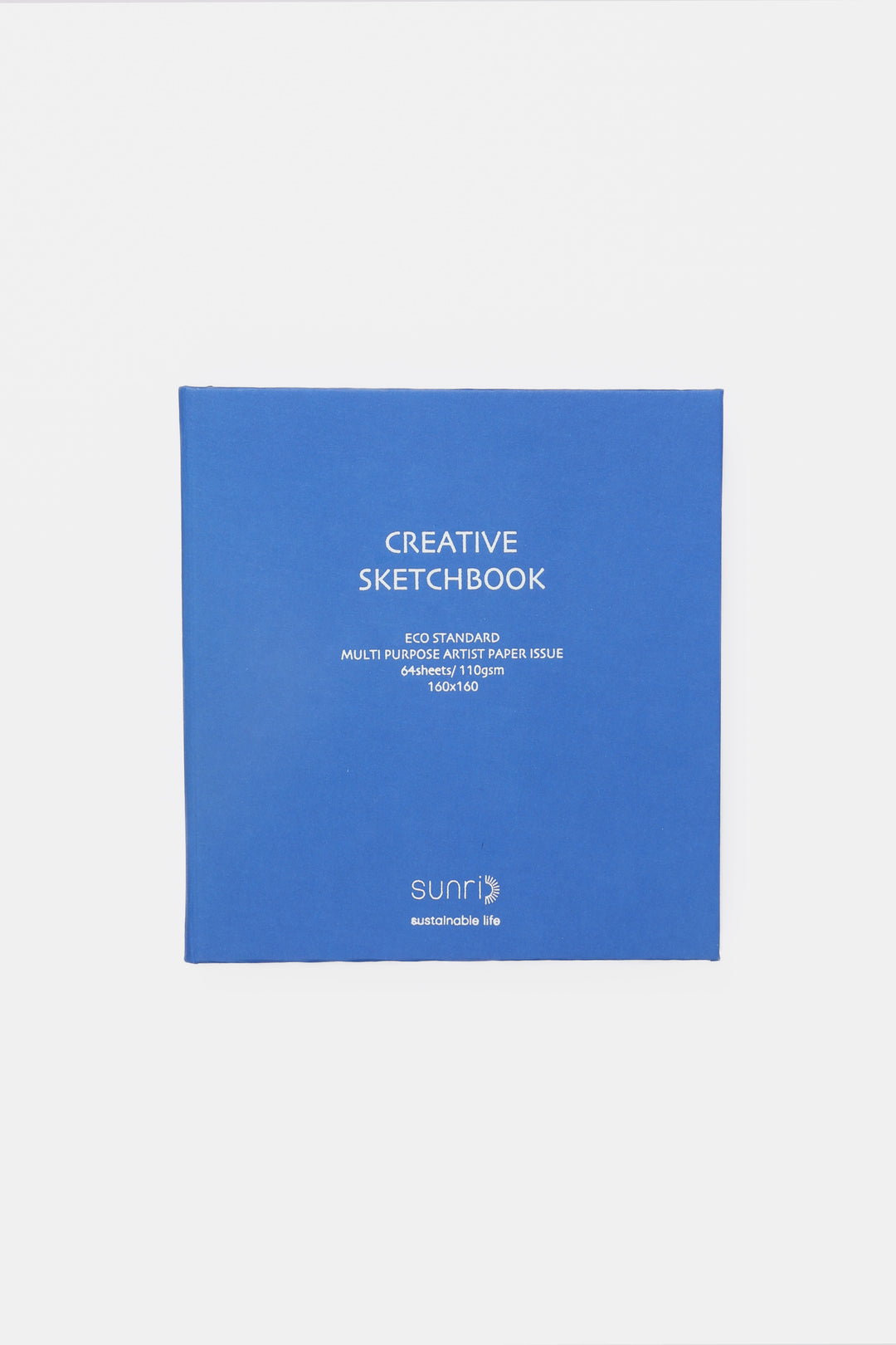 Front view of blue creative square sketchbook with sunri branding and clean white pages edge visible
