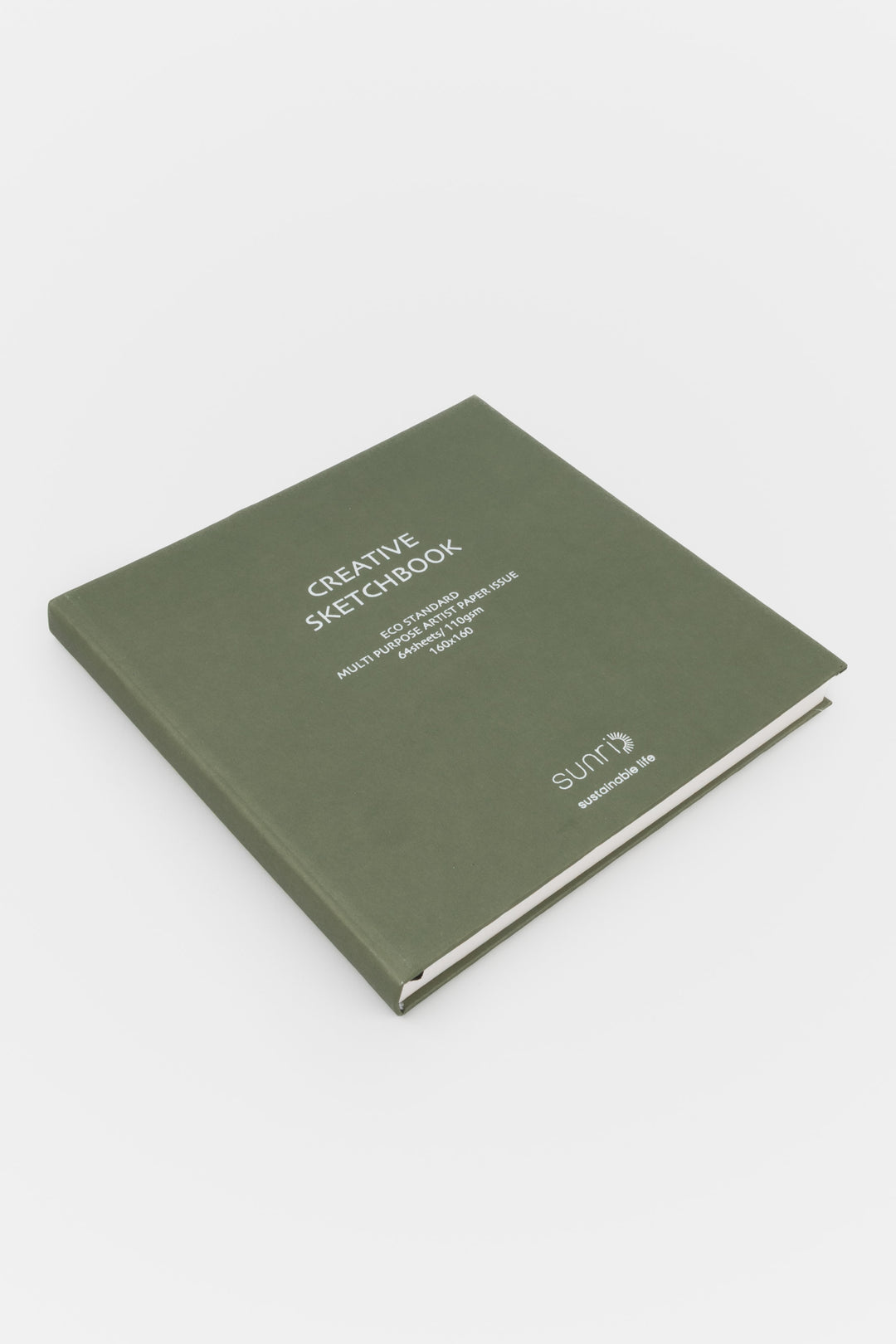Green notebook with 'Skuin' branding on a white background