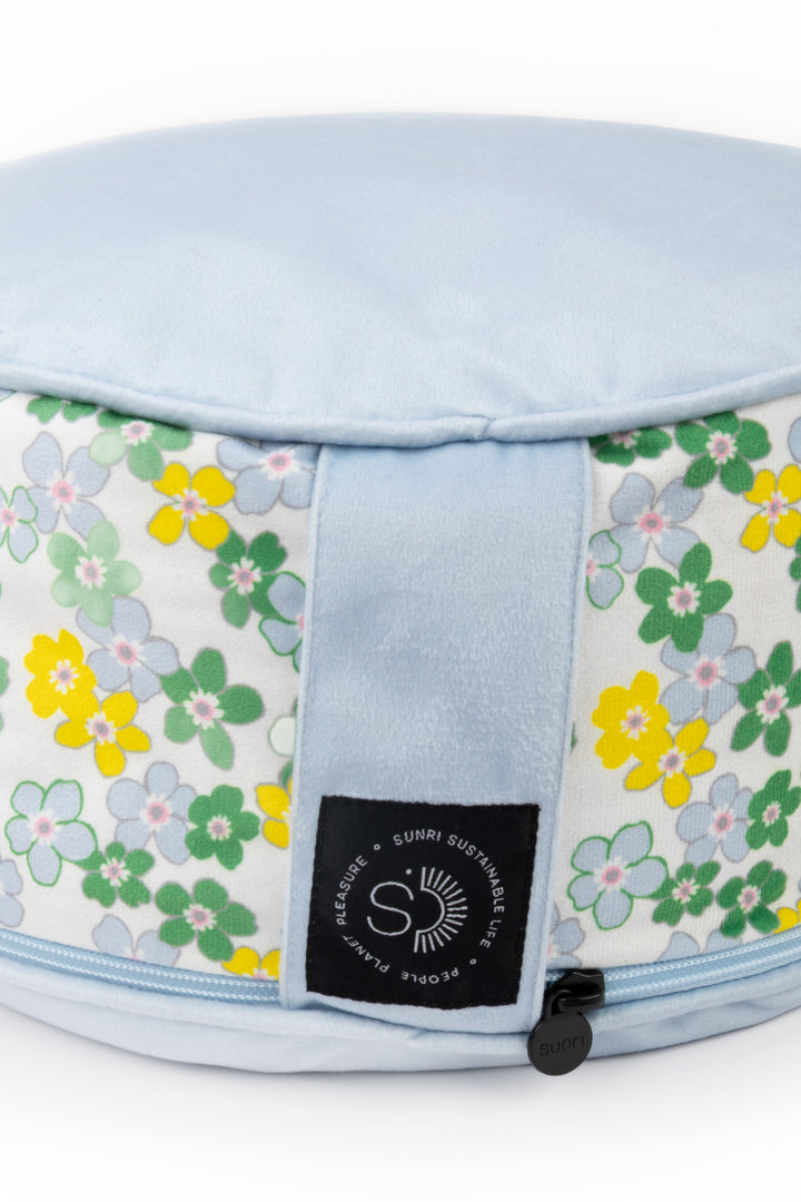 detail, label and zipper of meditation pillow with floral print