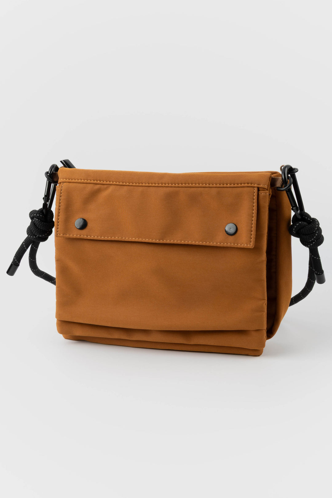 Orange bag with black straps on a white background