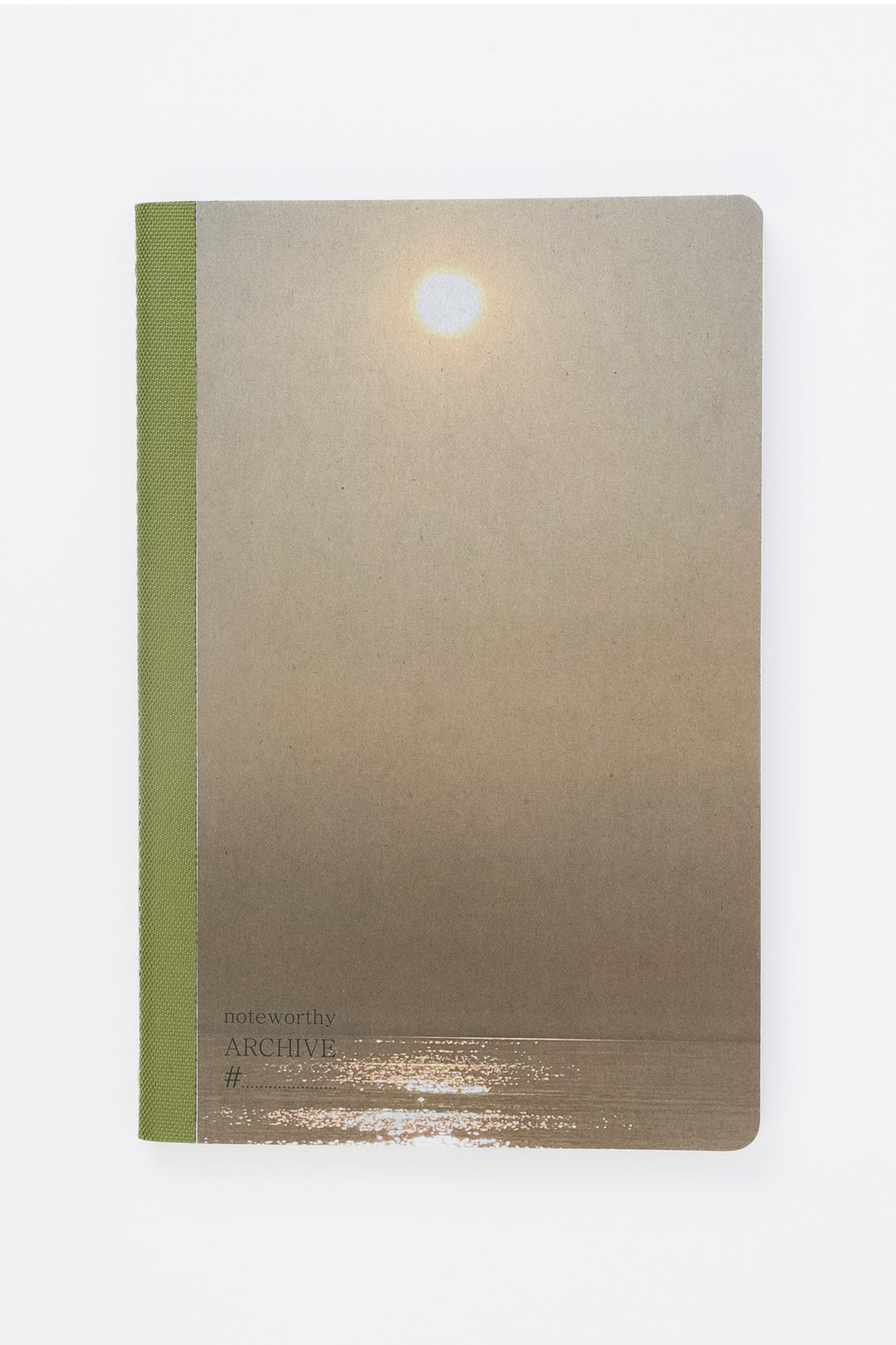 Notebook with cover image of sun and sea