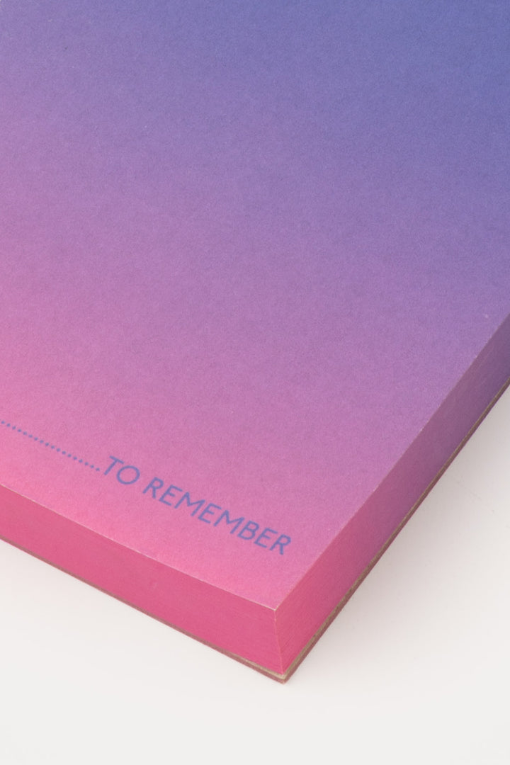 detail of gradient colourd notepad