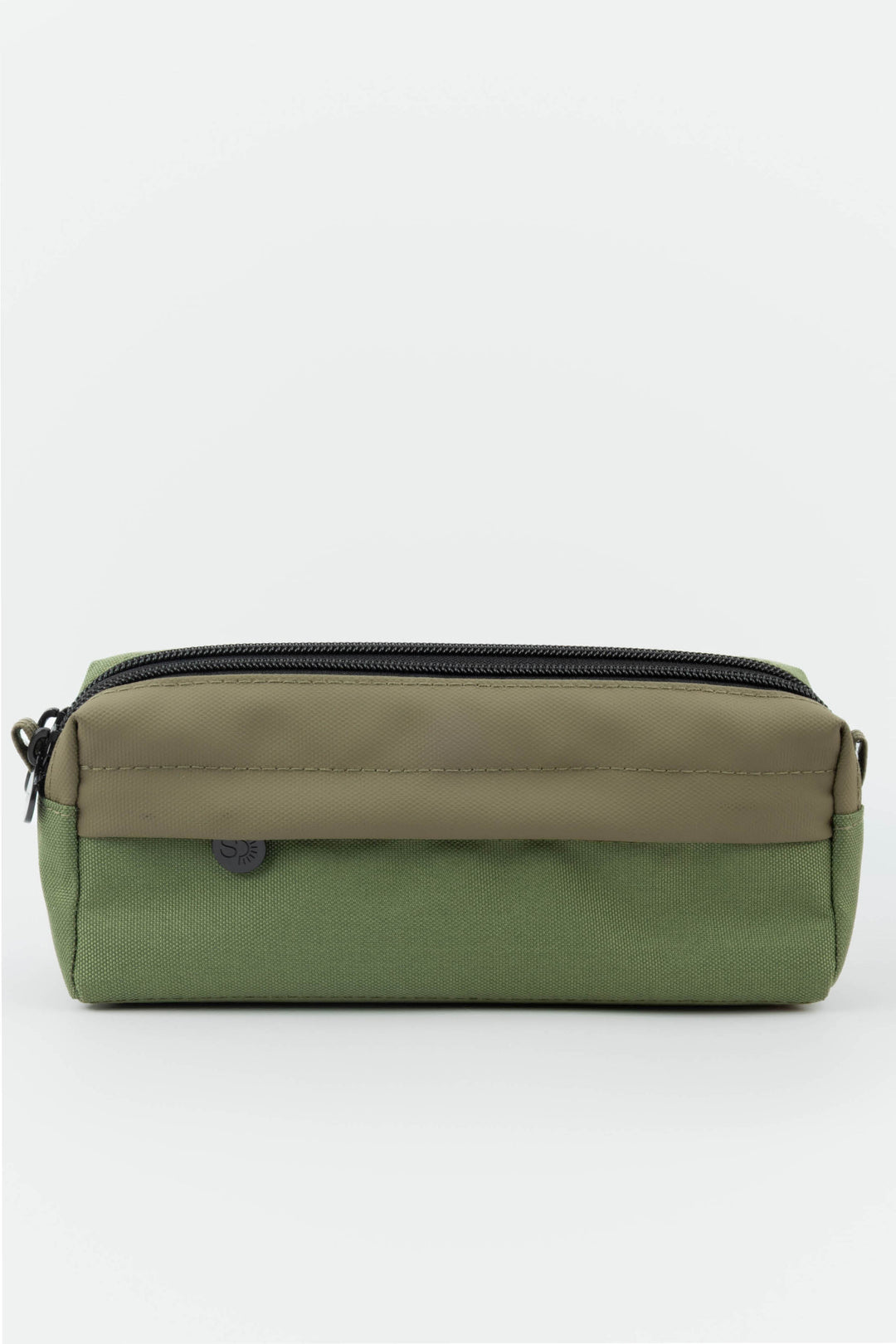 Green toiletry bag with a black zipper on a white background