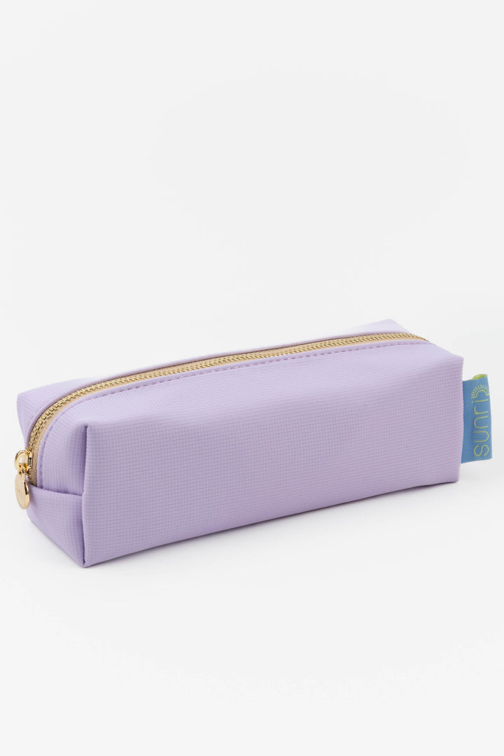 Purple pencil case with gold zipper on a white background