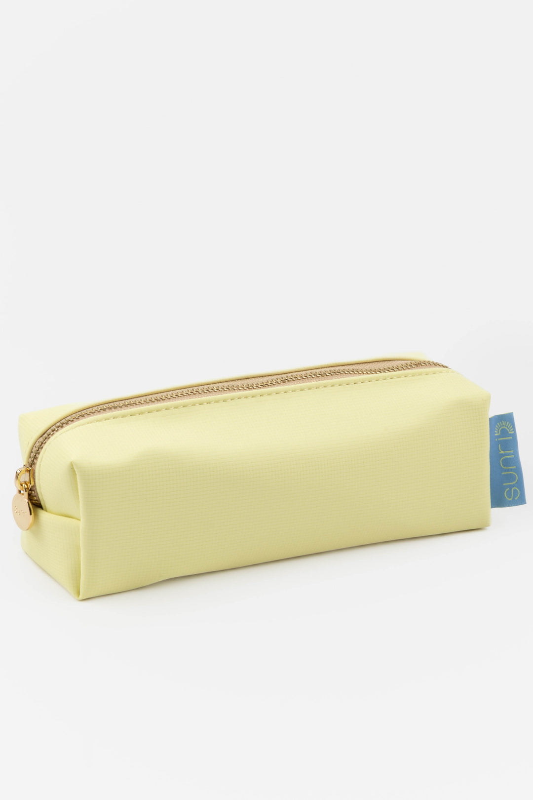 Light yellow pencil case with a gold zipper on a white background