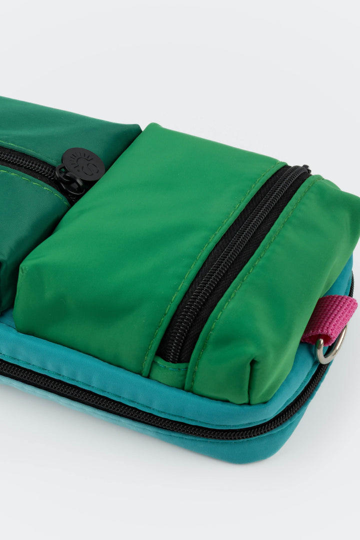 Close-up of the upper padded zipped compartment and zipper pull of the utility pencil case
