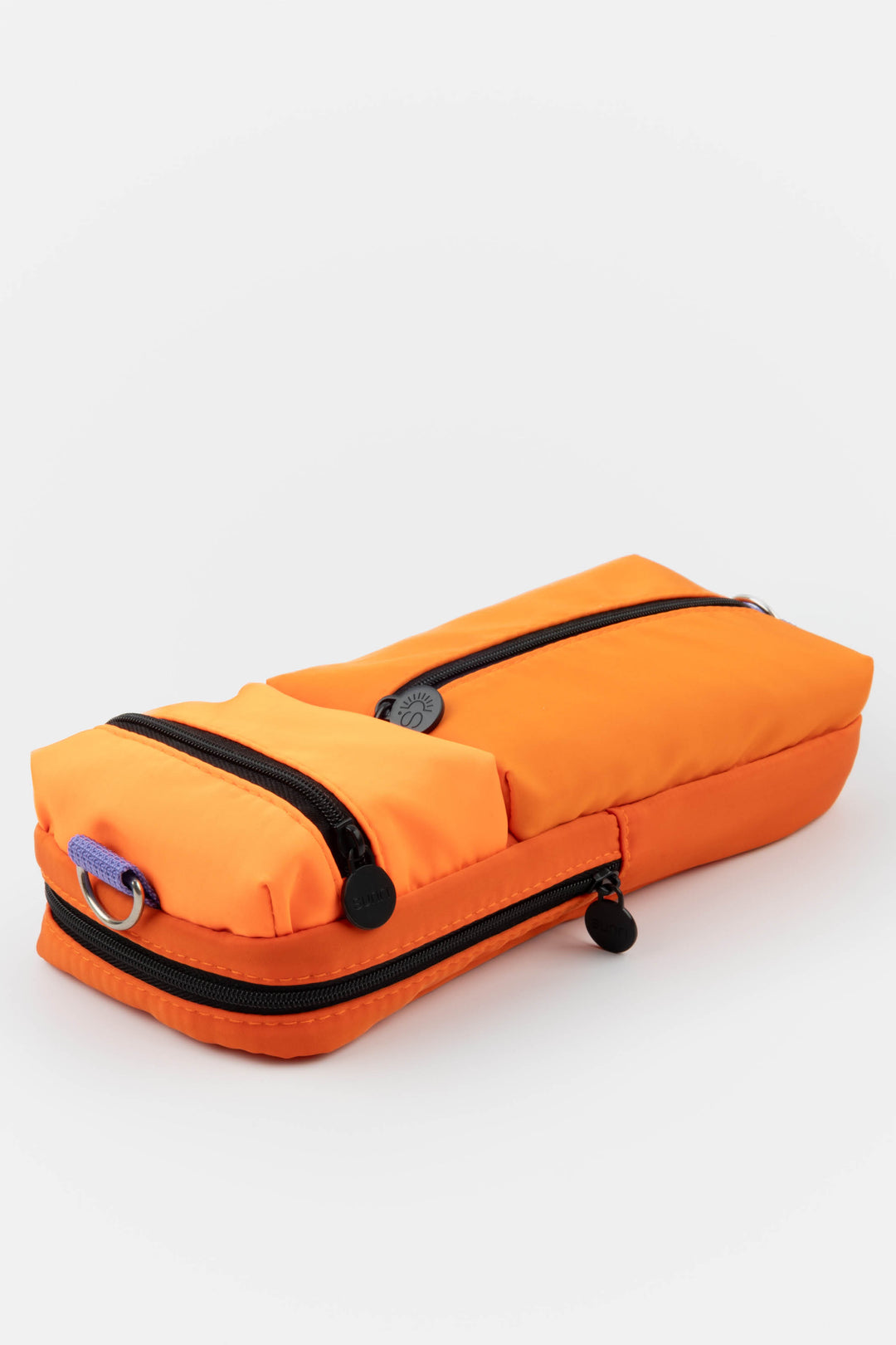 Utility pencil case shown from an angled side view with two padded zipped compartments