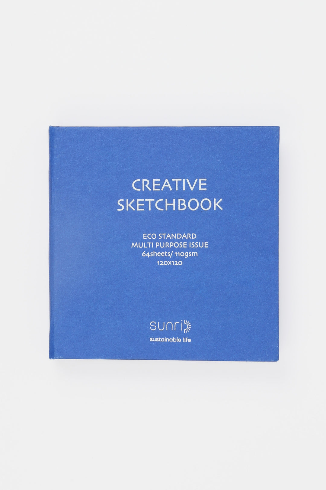 Blue sketchbook with white text on a light gray background