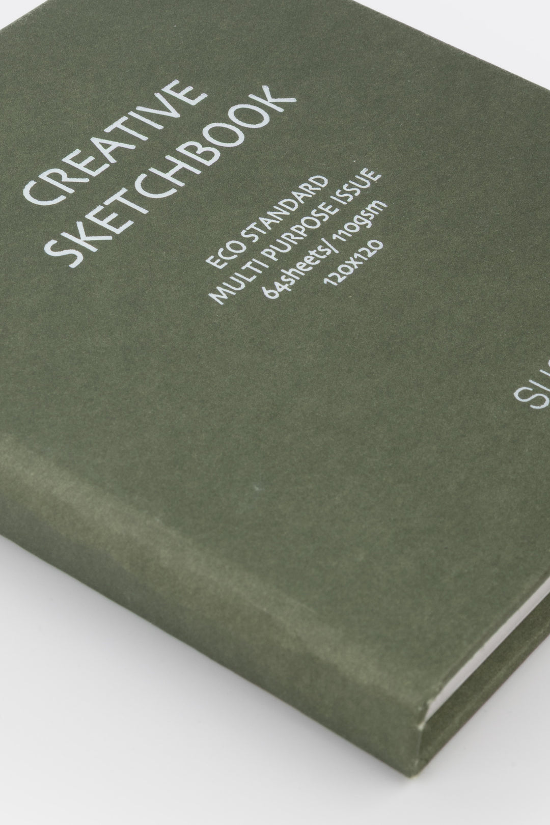 Green sketchbook with text on a white background