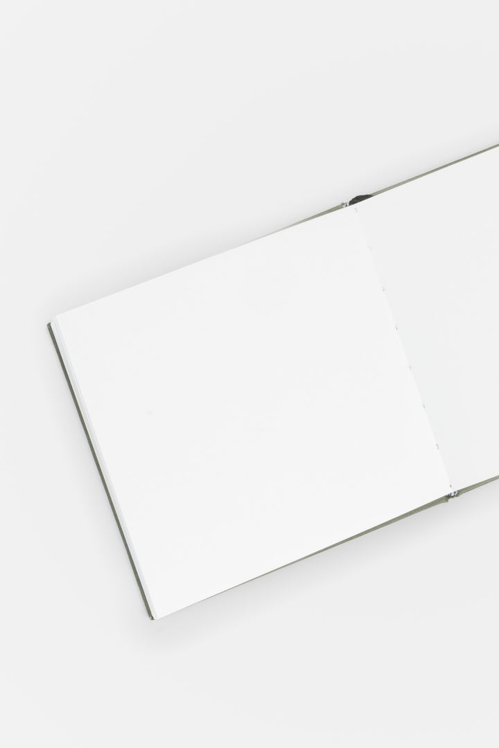 open sketchbook on a white background