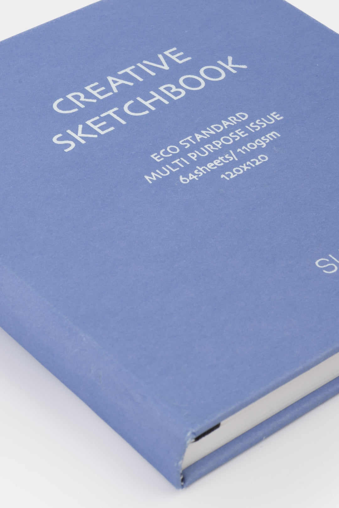 purple sketchbook with white text