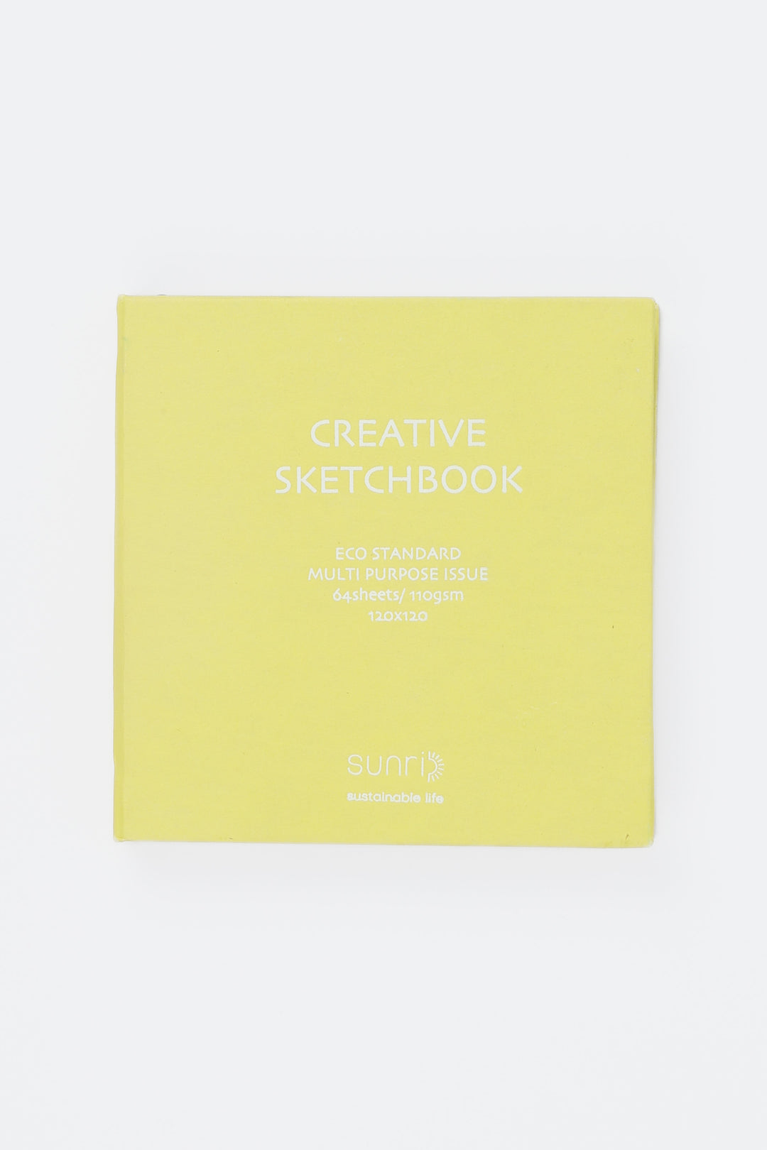 yellow square sketchbook with white text