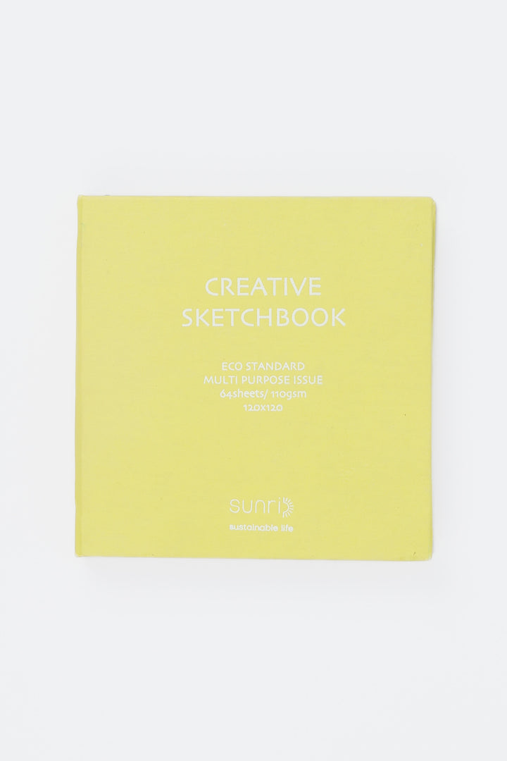 yellow square sketchbook with white text