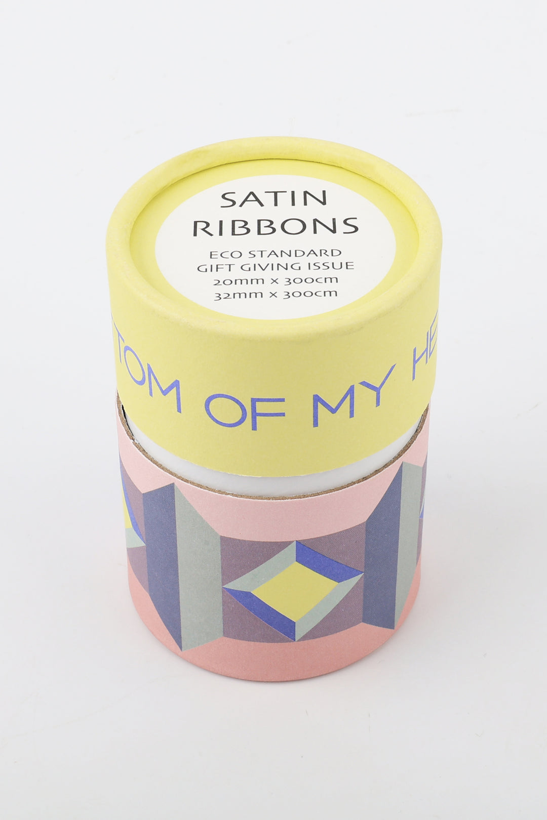 Satin ribbons packaging with geometric design on a white background