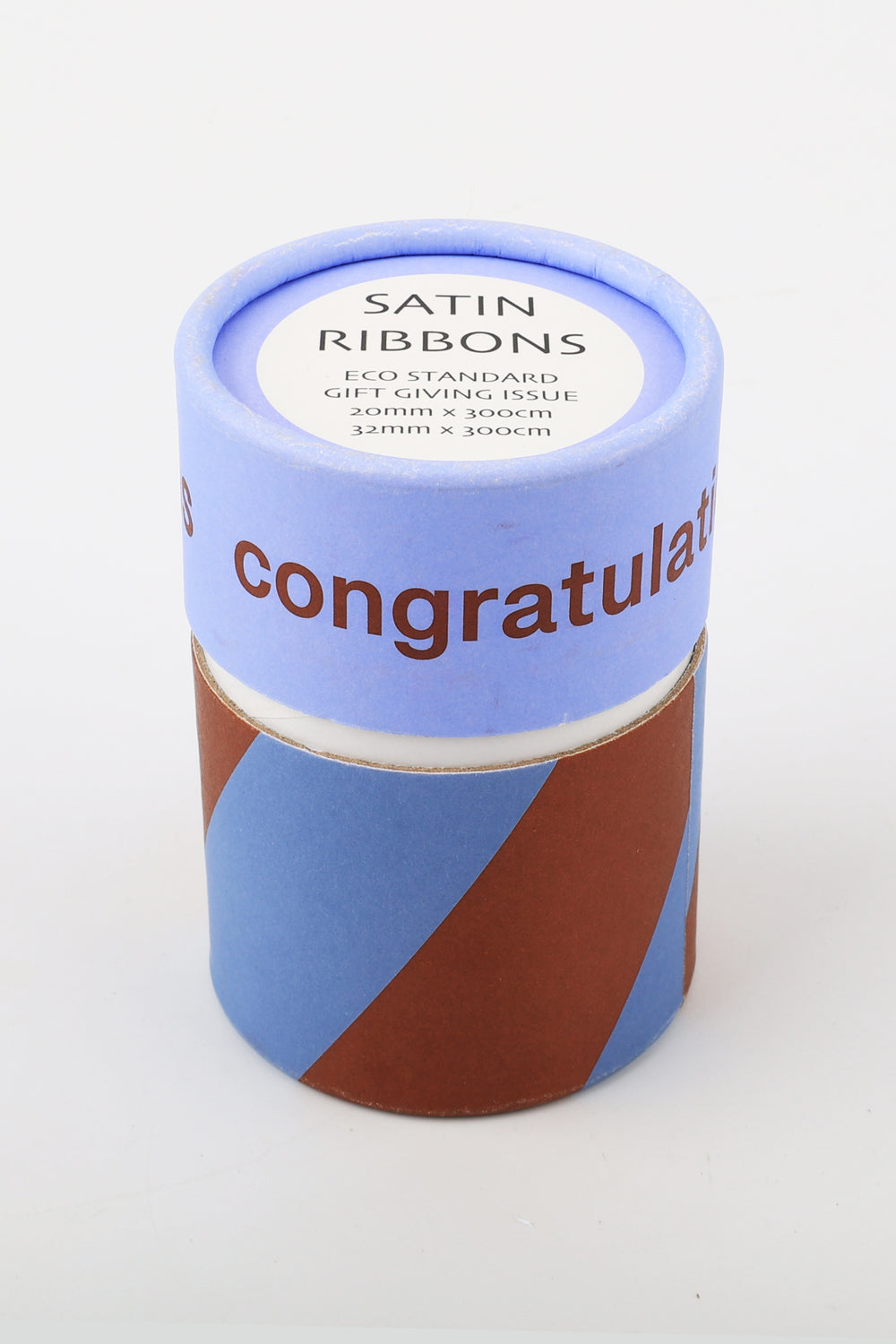 Container of satin ribbons with 'congratulations' text on a white background