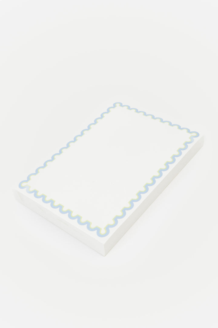 notepad with decorative blue rim 