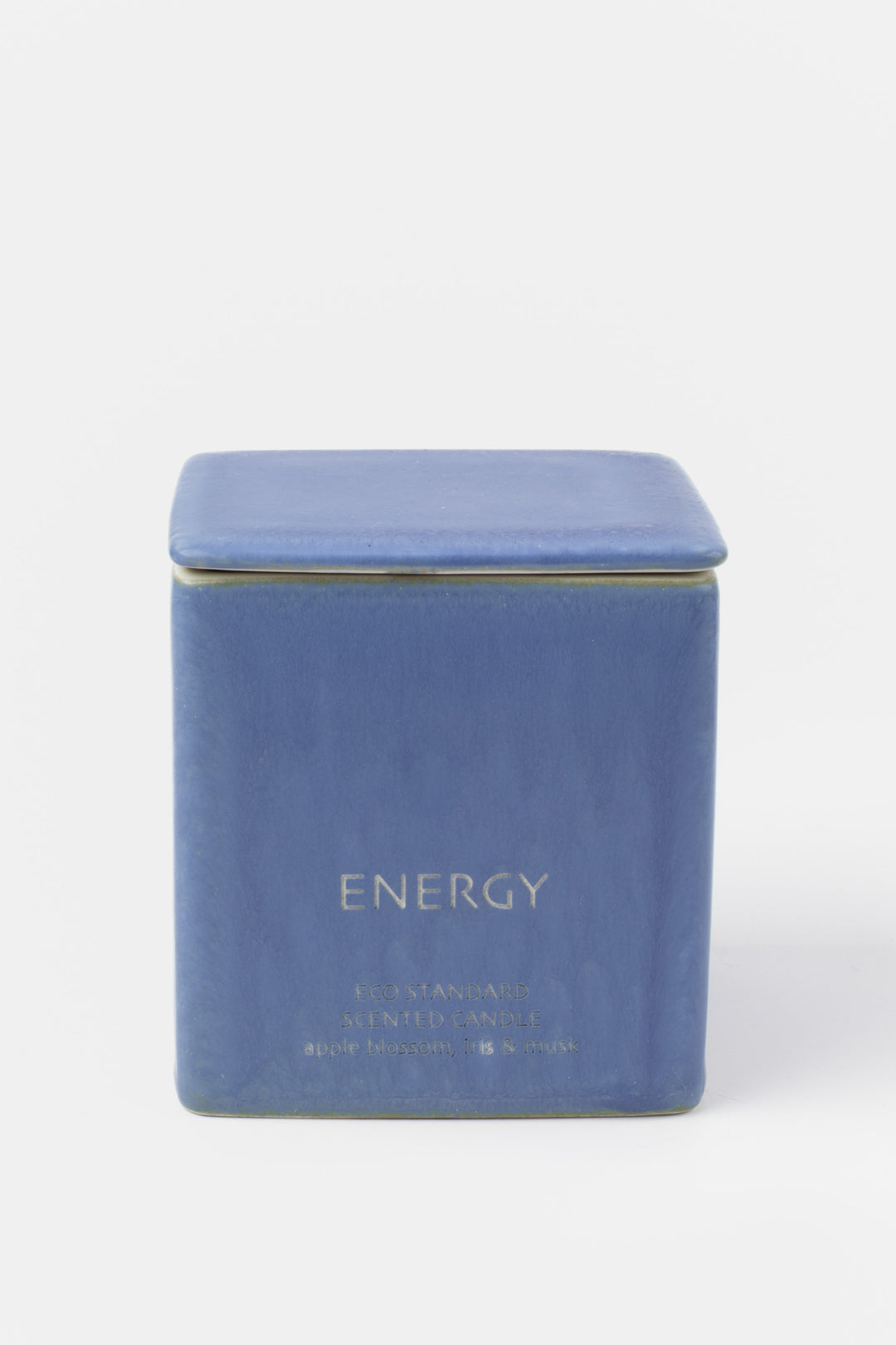 square blue ceramic candle with fitted lid, front view
