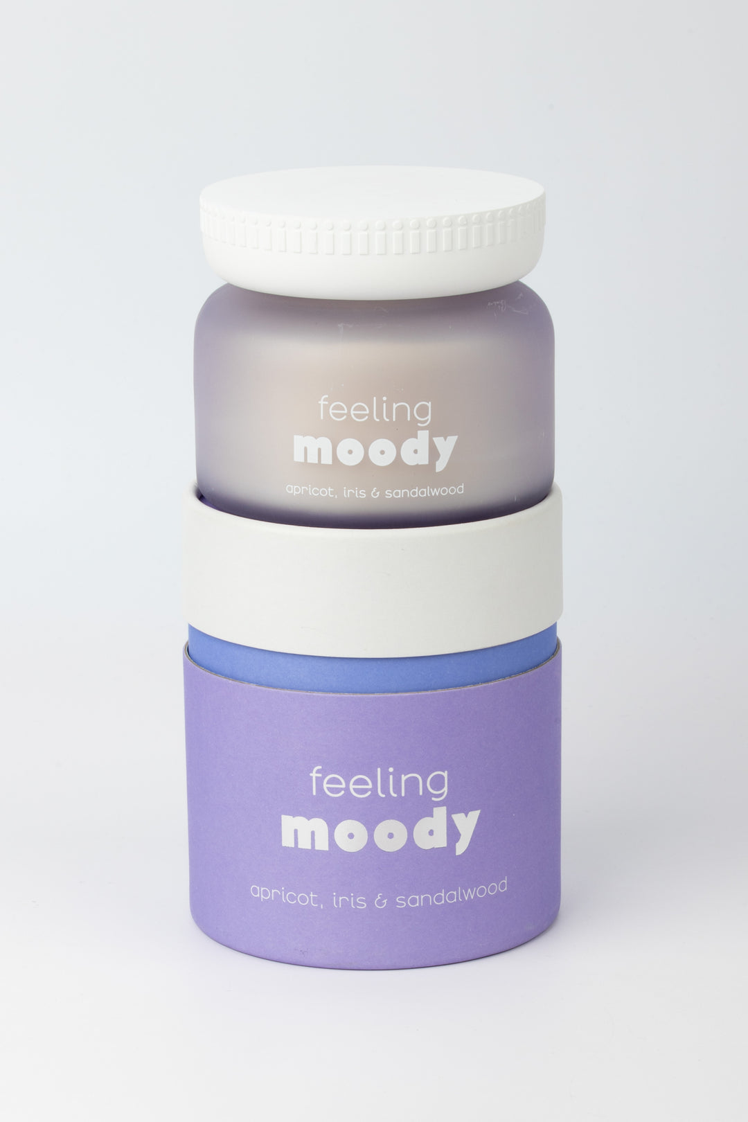 jars labeled 'feeling moody' on top of it's packaging on a light gray background