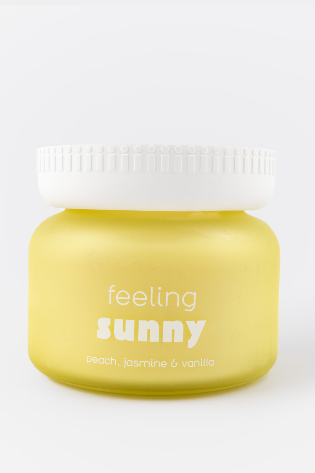 Yellow container with a white lid labeled 'feeling sunny' on a white background