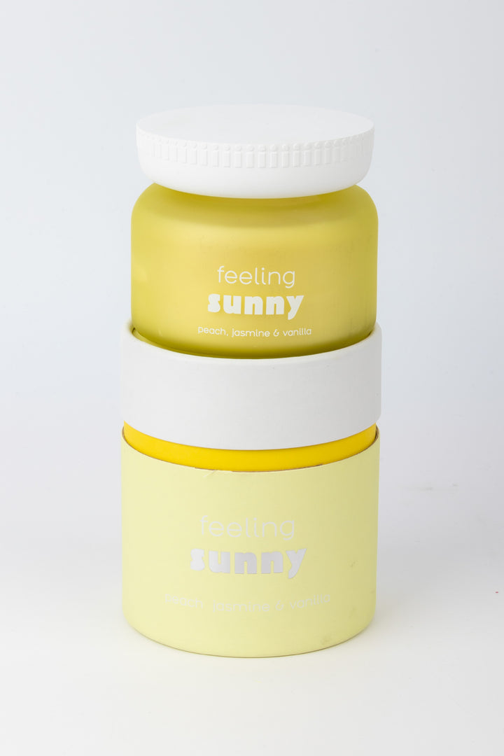 Two stacked containers with 'feeling sunny' text on a white background