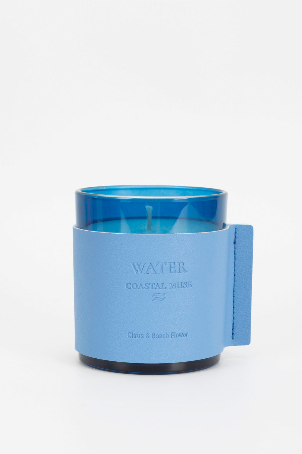 Blue candle in a blue holder with 'Water' text on a white background