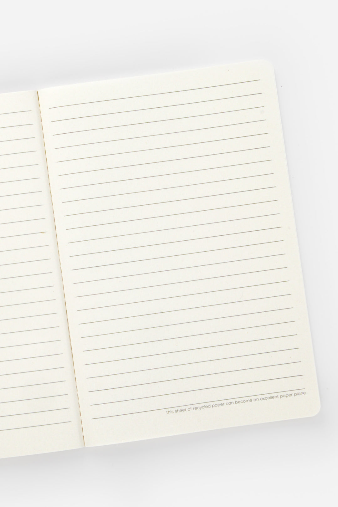 Open notebook with lined pages on a white background
