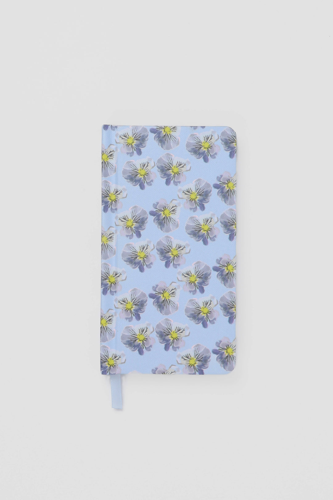 Floral notebook on a light gray background