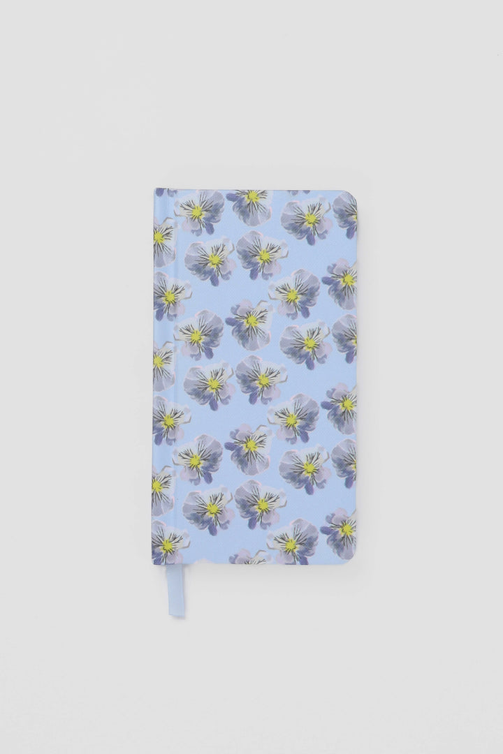 Floral notebook on a light gray background