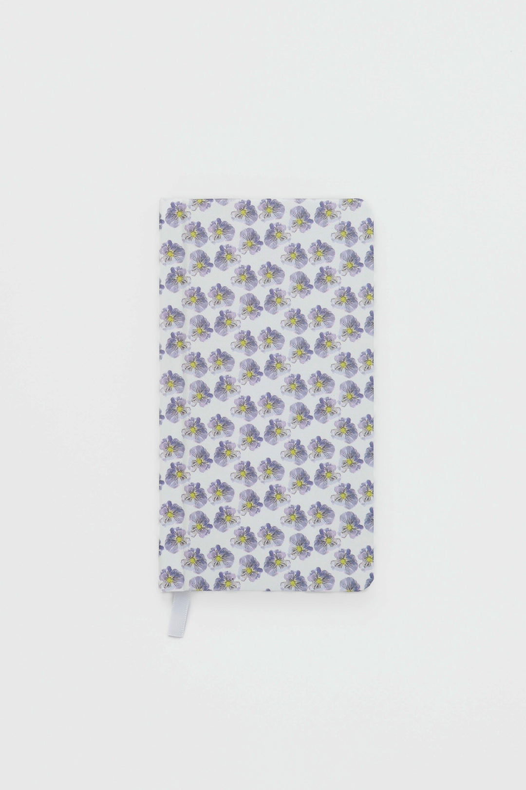 Notebook with floral pattern on a white background