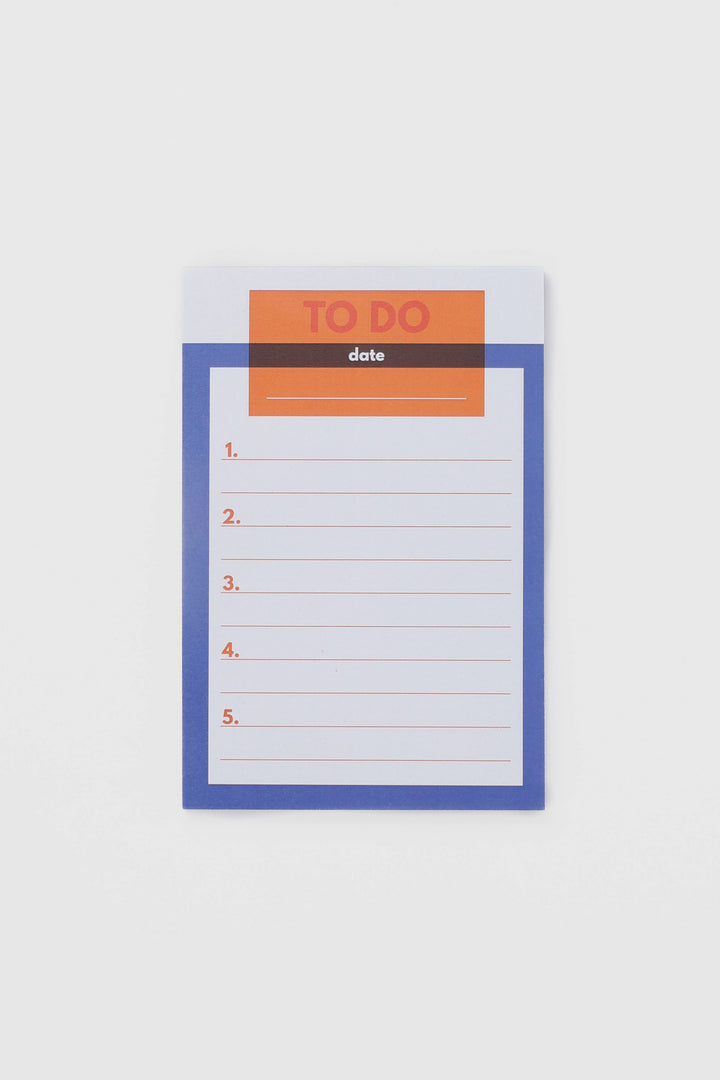 Blue colour-blocked to-do notepad with numbered lined section
