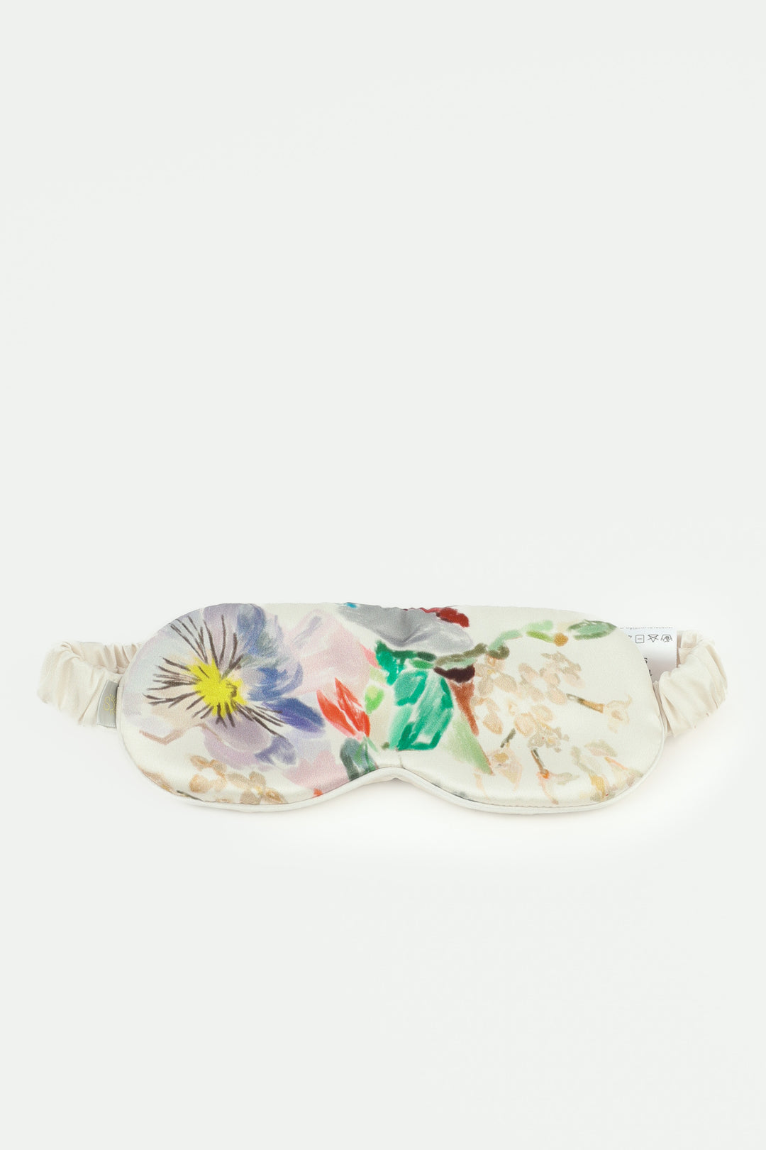 Floral patterned eye mask on a white background