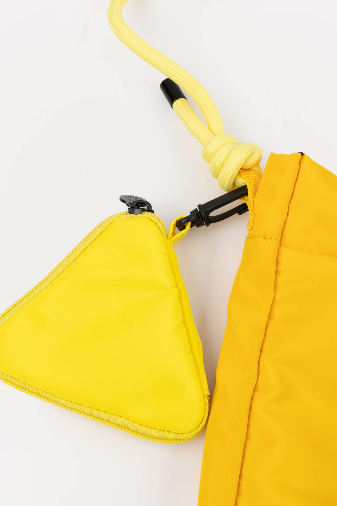 Yellow bag with a small pouch on a white background