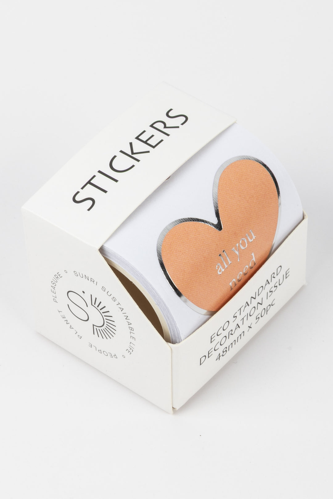 Heart-shaped stickers in a box with 'STICKERS' text on a white background