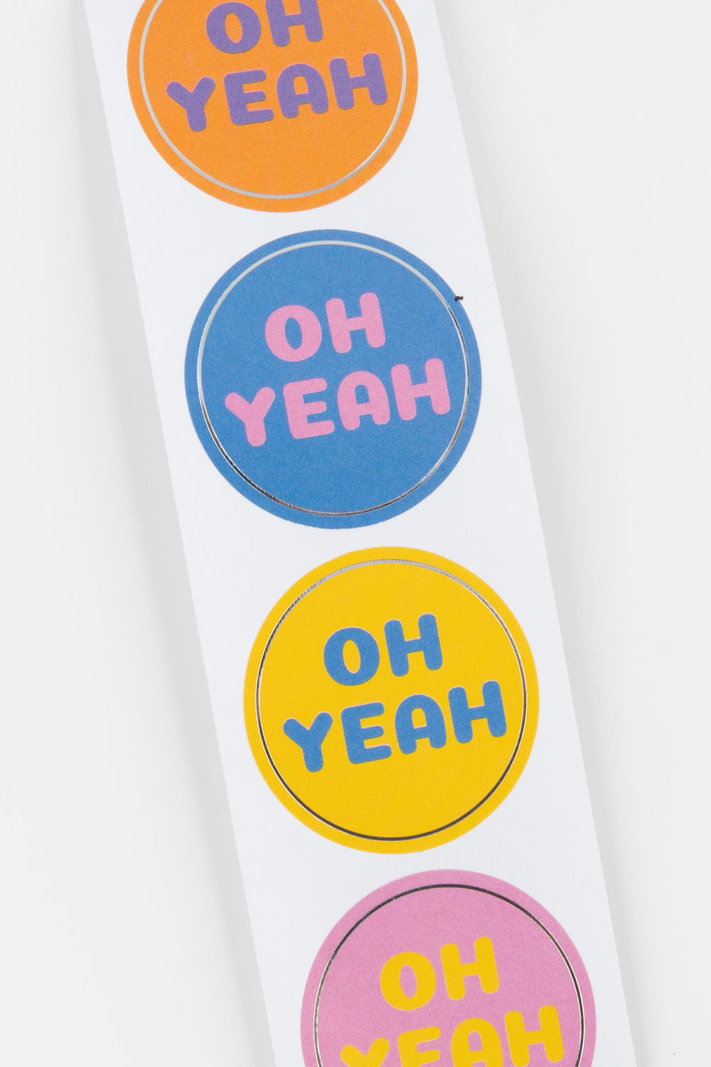 strip of 'OH YEAH' text in various colors on a white background