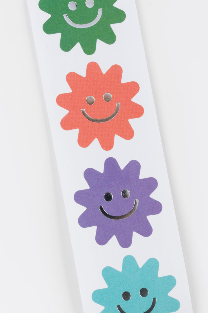Colorful flower-shaped smiley faces on stickers