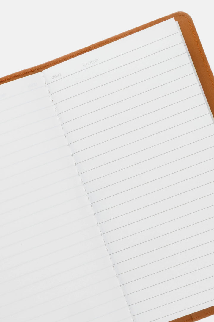 sketch journal with lined and blank pages on a white background