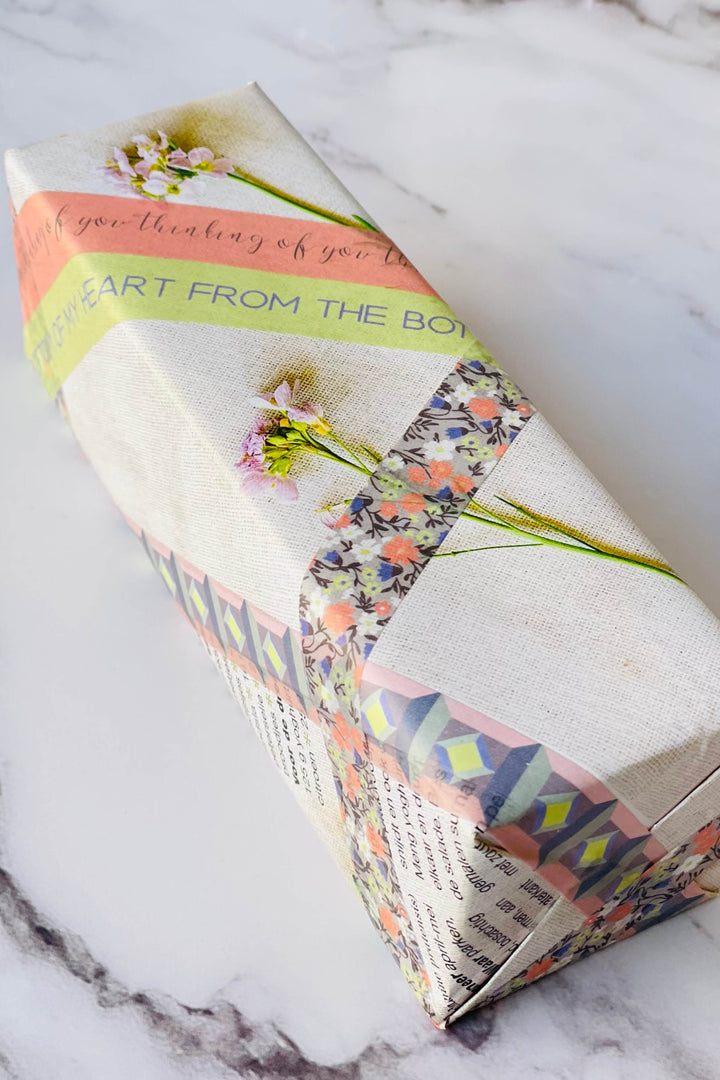 Gift box with floral design on a marble surface