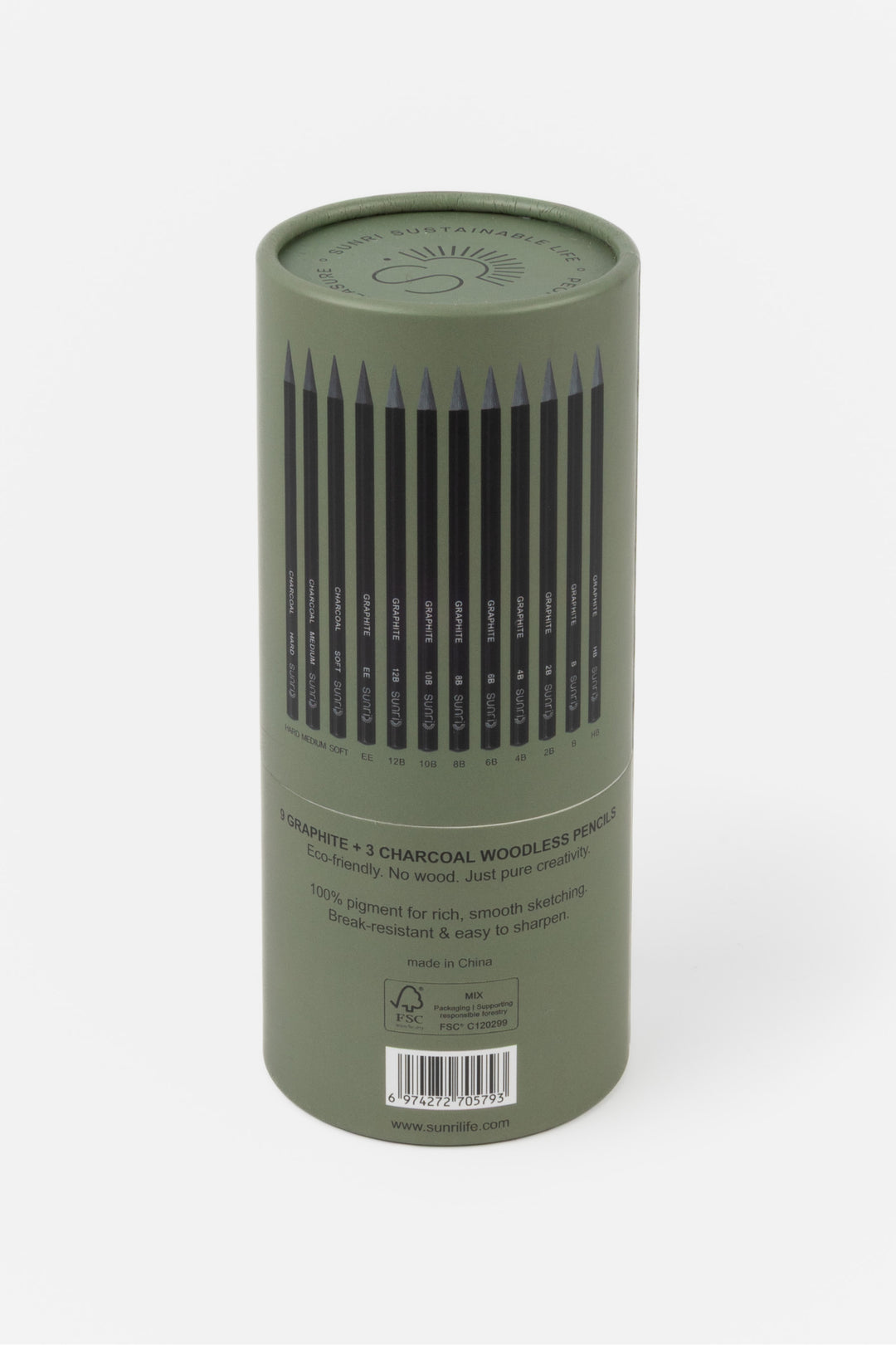 Green cylindrical container with charcoal pencils on a white background